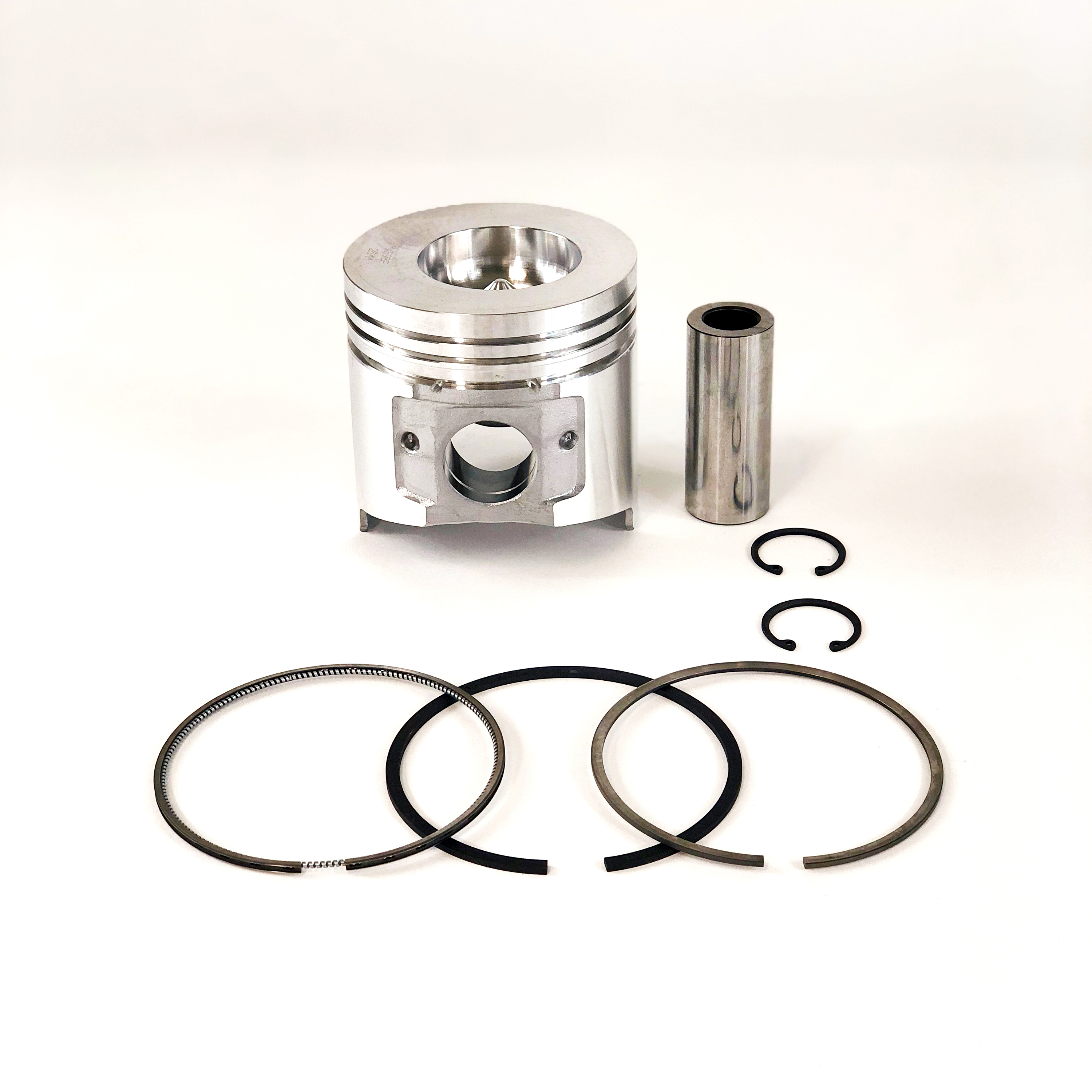 PISTON W/RINGS 0.010 4TNE98